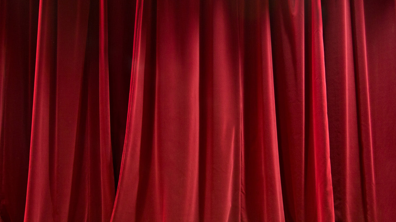 Close-up of red curtains with a soft focus